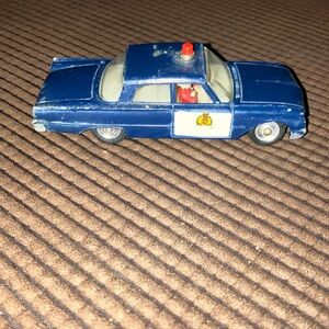 Vintage Dinky metal mini police car made in England